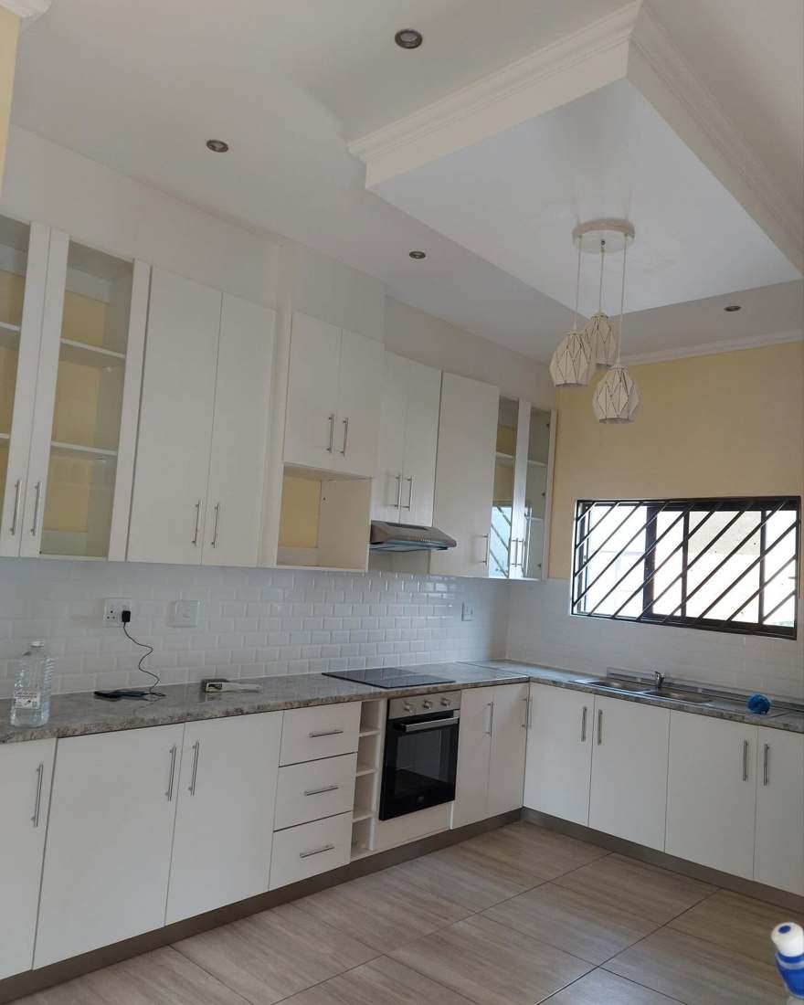 Modern white kitchen interior completed for handover
